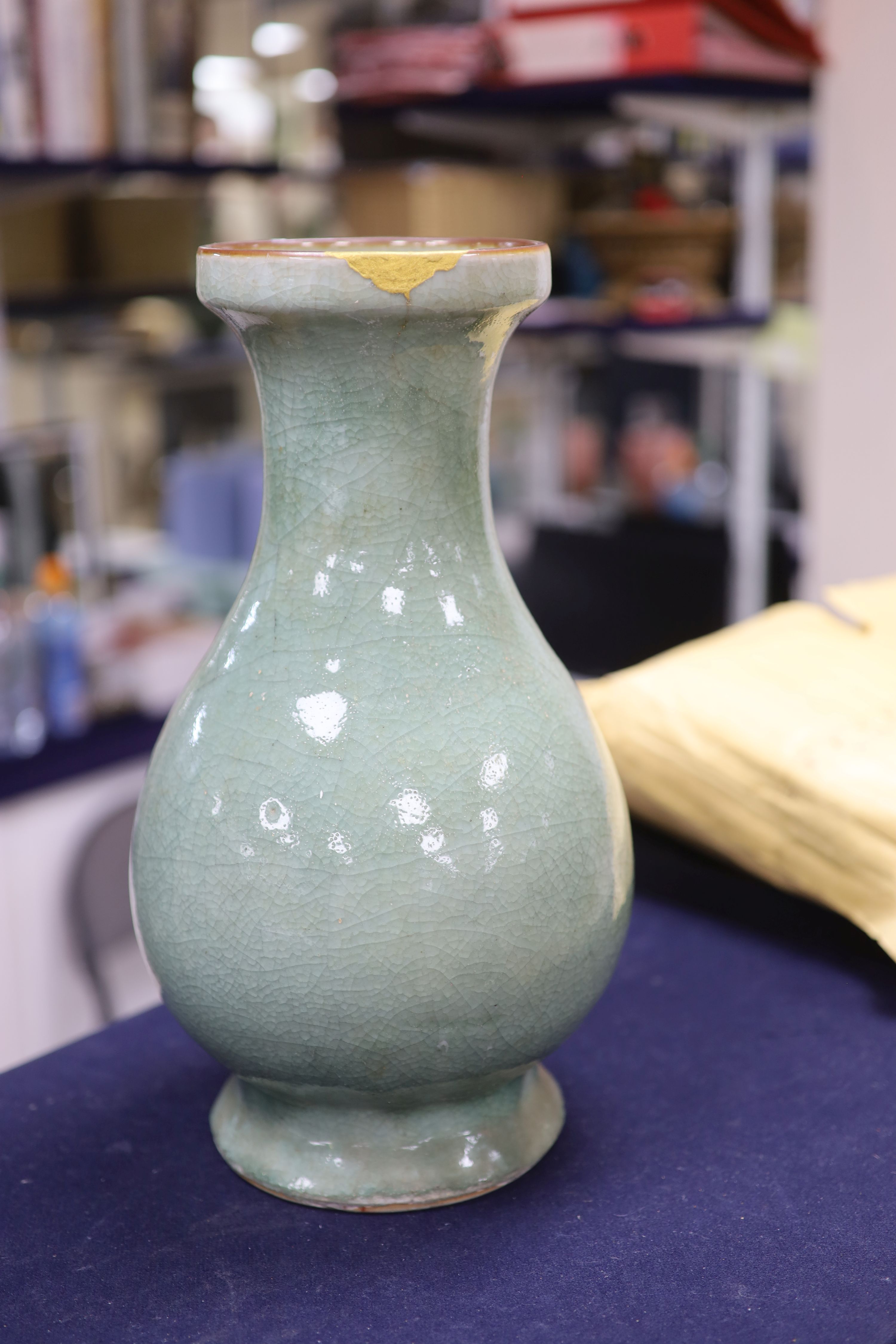 A Chinese celadon crackleglaze vase, probably 17th century or earlier, height 38cm